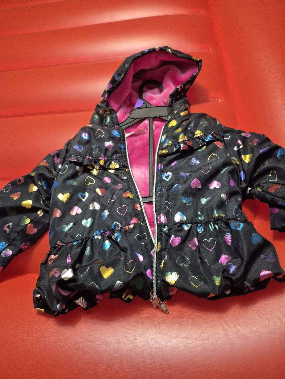 Penelope Mack Black Puffer Jacket with Pink Lining and Multicolor Heart Print